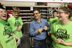 Team members sharing a moment with Dean Kamen, the founder of FIRST®